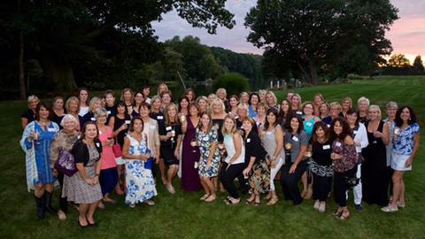 Group picture of the attendees of the 100 Women - 100 Dollars Maureen's Hope Foundation event.